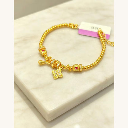 Gold Beaded Bracelet with Butterfly Charm